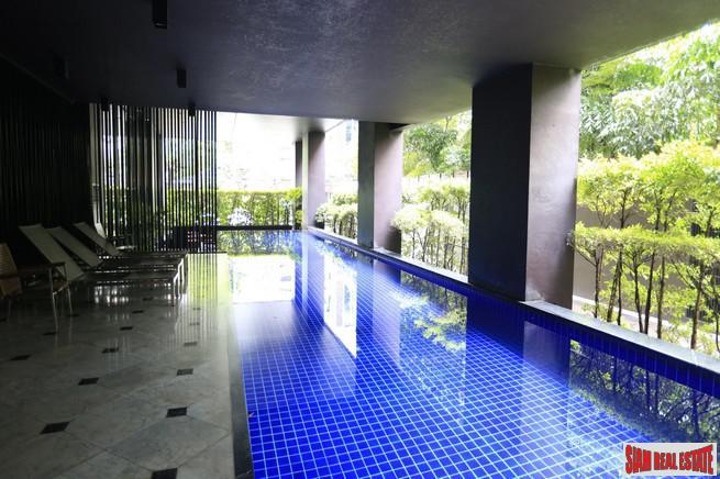 Noble Reveal Condominium | Two Bedroom Corner Condo with Wrap Around Windows and Fantastic City Views in Ekkamai-0