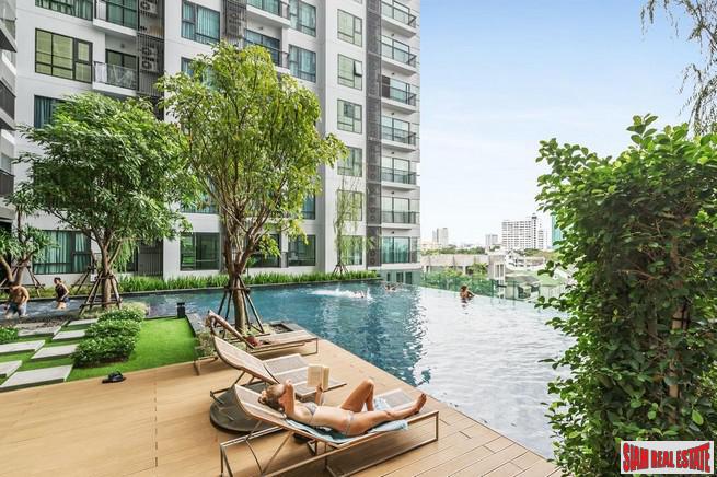 Rhythm Sukhumvit 36 | Comfortable One Bedroom Thong Lo Condo for Sale with City & Pool Views-0