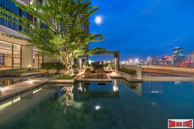 Chewathai Residence Asoke | Brightly Decorated City View Condo with Loft-style Bedroom near MRT Rama 9