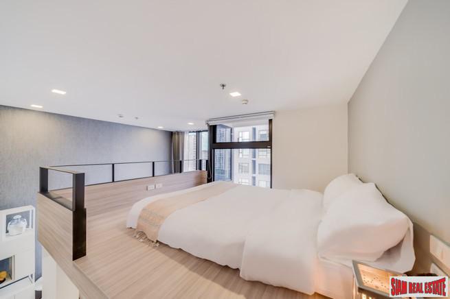 Chewathai Residence Asoke | Brightly Decorated City View Condo with Loft-style Bedroom near MRT Rama 9-11