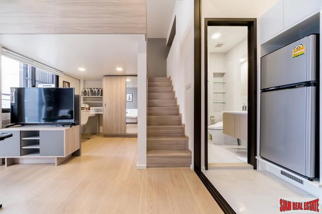 Chewathai Residence Asoke | Brightly Decorated City View Condo with Loft-style Bedroom near MRT Rama 9-12
